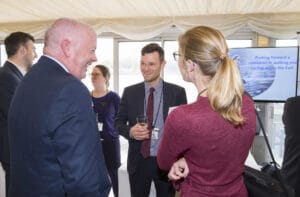 Andrew Summers, Strategic Director at Transport East speaking to other attendees at the Parliamentary reception